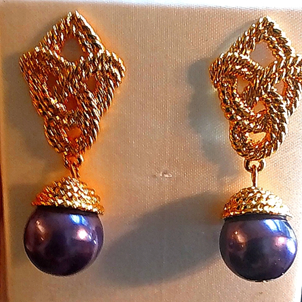 Vintage Avon gold-tone knotted rope design earrings with round purple dangles